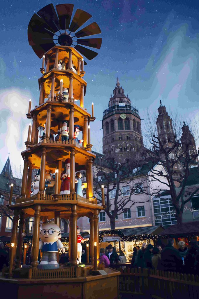 Christmas pyramid Mainz with cathedral in the background