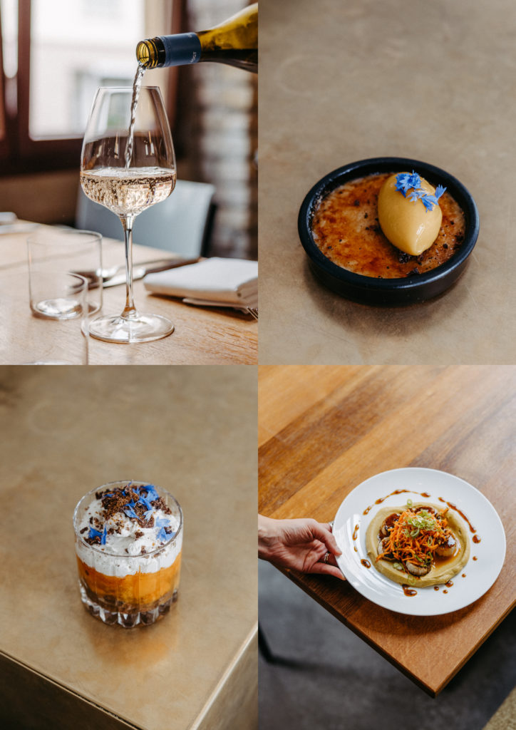 Weißwein wird in ein Glas eingeschenkt, dazu ein Menü mit Dessert, Cocktail und veganem Hauptgang – feine, saisonale Küche im Willichs Restaurant.
